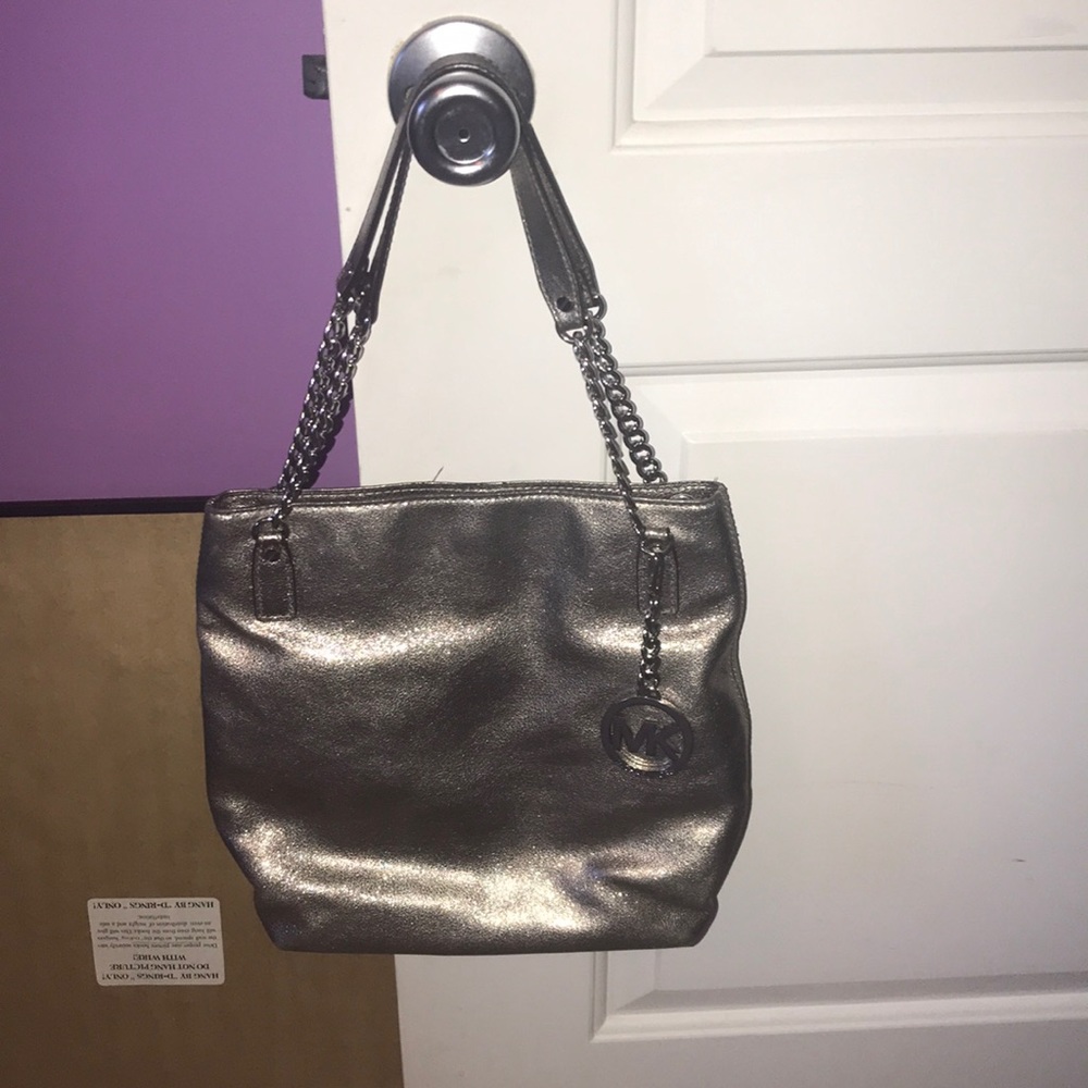 Silver Michael Kors purse.